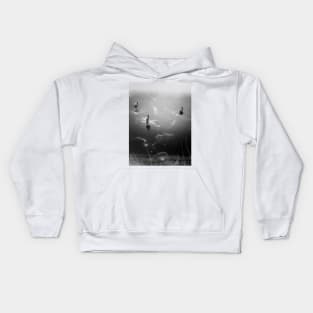 Ducks on a frozen lake Kids Hoodie